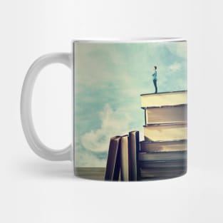 student on a book's pile Mug